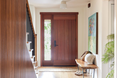 Example of a transitional entryway design in Other