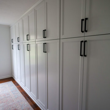 Floor-to-Ceiling Built-In Cabinetry Wall