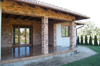 This is an example of a brown brick house exterior in Los Angeles.