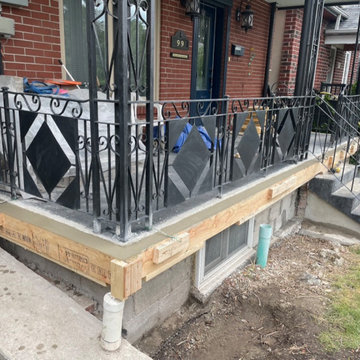 Porch repair with new stone veneer