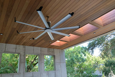 Example of a trendy home design design in Tampa