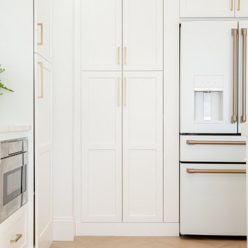 All White Transitional Kitchen with Herringbone Wood Floor