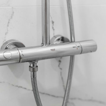 Two Bathroom Renovation and Basement Water Damage Restoration in Brooklyn