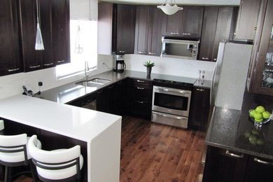Example of a minimalist kitchen design in Other