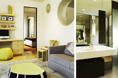 Example of a minimalist family room design in Denver