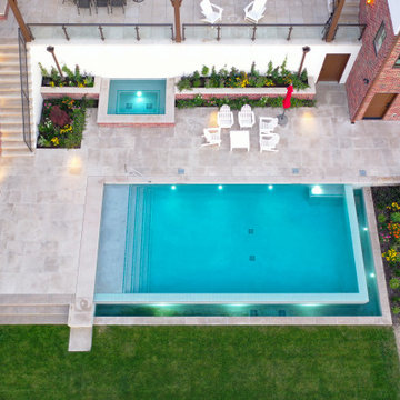 Lakeside Retreat with this Exquisite and Sophisticated Pool & Spa Oasis