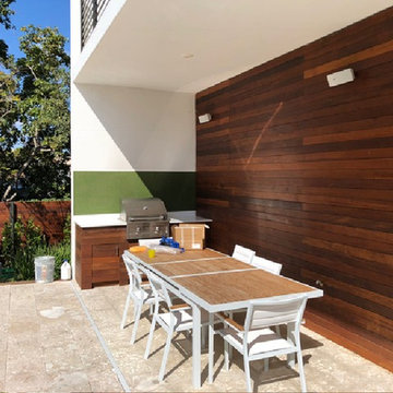 Outdoor grill with green glass mosaic