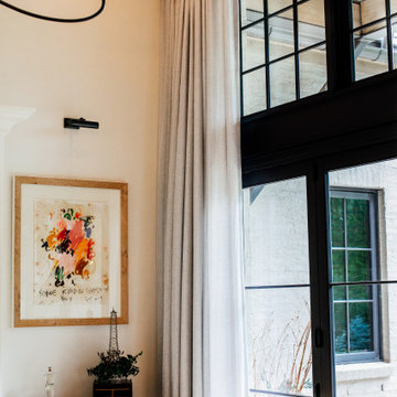 Functional Drapes with 2-Finger Pinch Pleat on a Matte Black Traverse Rod