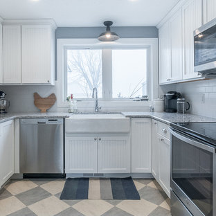Photo of a small country u-shaped kitchen pantry in Minneapolis with a farmhouse sink, beaded inset cabinets, white cabinets, granite benchtops, white splashback, ceramic splashback, stainless steel appliances, no island and linoleum floors.