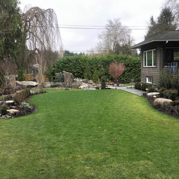 Bocce Ball Court, Pond, Granite Rocks and Dimensonal Flagstone