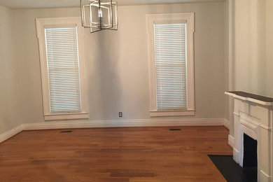 Living room - industrial living room idea in Louisville