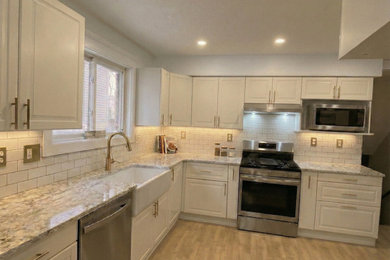 Example of a trendy kitchen design in Toronto