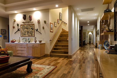 Example of a large mountain style formal and open concept medium tone wood floor living room design in Other with white walls, no fireplace and no tv