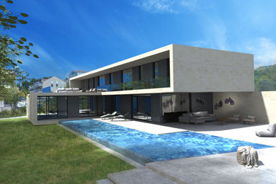 Ejemplo de fachada de casa blanca mediterránea pequeña de dos plantas con revestimiento de hormigón y tejado plano