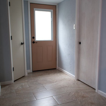 Backdoor entrance after custom pantry, pocket door and tile floor install