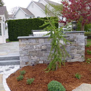 Bluestone Patio with Granite Cobblestone walls