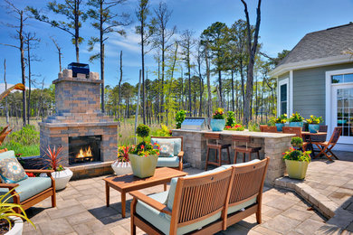 Elegant courtyard patio photo in Other with no cover