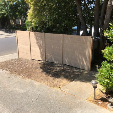 Garbage can concealment fence