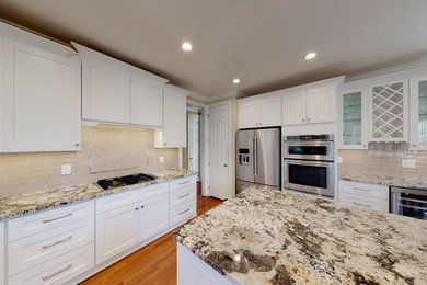 Example of a large transitional kitchen design in Raleigh