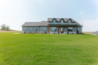 Example of a farmhouse exterior home design in Dallas