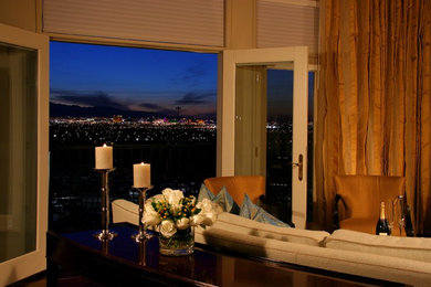 Mid-sized trendy loft-style dark wood floor living room photo in Other with beige walls and a wall-mounted tv