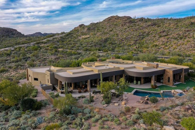 Example of a trendy home design design in Phoenix