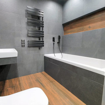 Дизайнерский ремонт ванной комнаты в темных тонах