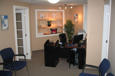 Large minimalist home office photo in Toronto