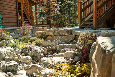 Inspiration for a rustic landscaping in Calgary.