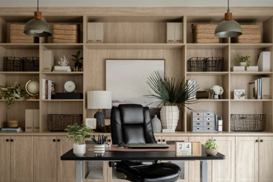 Mid-sized 1960s freestanding desk carpeted study room photo in Seattle with gray walls