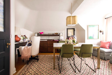 Mid-sized transitional freestanding desk medium tone wood floor and brown floor home office photo in Chicago with white walls