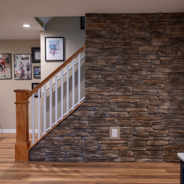 Finished Basement with College Football Theme in Northville, MI