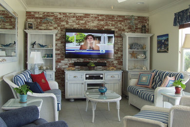 Design ideas for a beach style family room in Orange County.