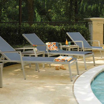 Travira Chaise Lounges with Vintage Tekwood Arms on Pool Deck