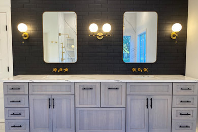 Minimalist master black tile and porcelain tile double-sink bathroom photo in Austin with an undermount sink, quartz countertops and white countertops