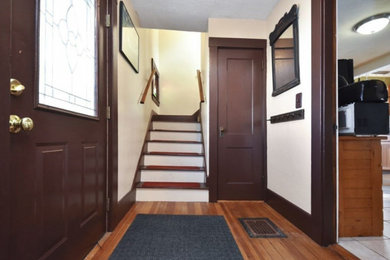 Inspiration for a timeless entryway remodel in Boston