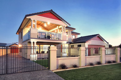 This is an example of a contemporary two-storey brick beige exterior in Perth with a gable roof.