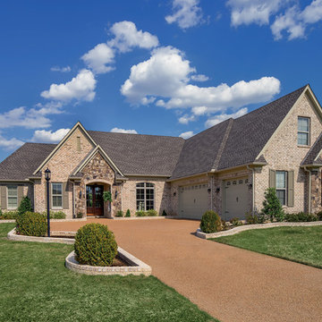 Nottingham Tudor Brick & Tennessee Fieldstone Rock Home - Tennessee