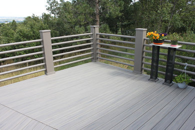 Deck - mid-sized backyard deck idea in Denver with no cover