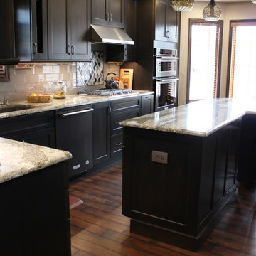 DuraSupreme Peppercorn Kitchen With Cambria Tops and Black Stainless Appliances