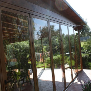 Chiusura portico con vetrate impacchettabili in alluminio