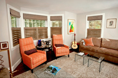 Example of a mid-sized eclectic formal and enclosed dark wood floor living room design in Portland Maine with beige walls