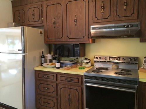 A Year In Review Of How I Painted My Laminate Cabinets With Two