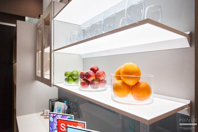 Pixalux panels create stunning illuminates surfaces and shelves in a kitchen