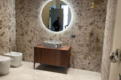 Example of an eclectic master bathroom design with furniture-like cabinets and a freestanding vanity