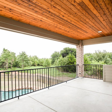 Traditional Brick Home with an Airplane Hanger
