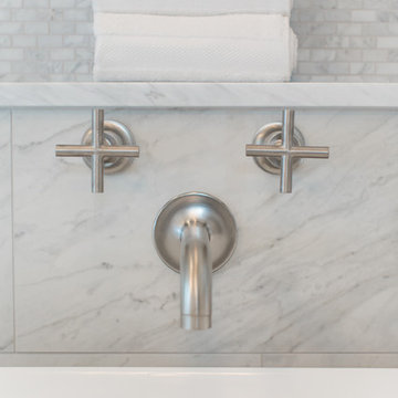 Bathroom | Elegant Custom Cabinets | Marble Tile & Freestanding Tub