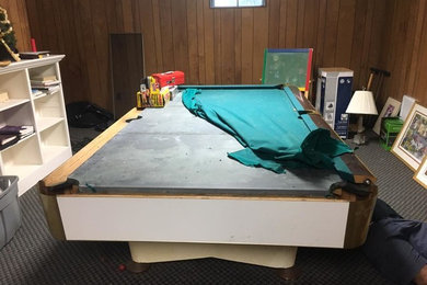 Pool table removal before picture