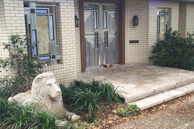 Cast Stone Lion at Entry