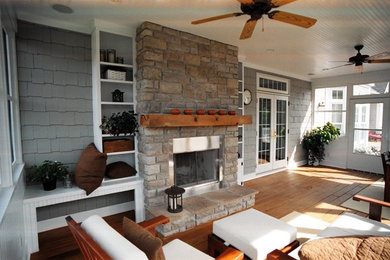 Large arts and crafts screened-in back porch photo in Other with decking and a roof extension